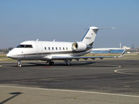 N550LG @ KCCR - TSA Stores (The Sports Authority), Inc. (Englewood, CO) 1993 Canadair CL-600-2B16 (with winglets) on PSA ramp at Buchanan Field (Concord), CA  - by Steve Nation