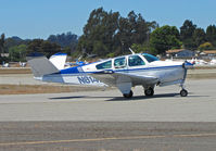 N6147V @ KWVI - 1961 Beech S35 Bonanza taxis @ Watsonville Fly-In - by Steve Nation