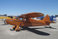 N8306K @ KWVI - Locally-based 1946 Stinson 108 (can you say ORANGE!) @ Watsonville Fly-In - by Steve Nation
