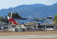 N510TT @ KWVI - T & T Trucking (Lodi, CA) 1944 North American P-51D painted as NL510TT 44-74008 VF-T with red nose near touchdown @ Watsonville Fly-In - by Steve Nation
