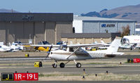 N66684 @ KCCR - Locally-based 1974 Cessna 150M on landing roll RWY 19L at Buchanan Field - by Steve Nation