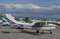 N10YT @ KSQL - N10YT LLC (Missoula, MT) 1976 Cessna T210L on visitor's ramp at San Carlos, CA - by Steve Nation