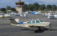 N171X @ KPAO - Looking good for almost 50! Beautiful 1962 Beech K35 Bonanza of Teknet Inc (Rigby, ID) taxiing at Palo Alto, CA - by Steve Nation