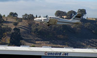 N14012 @ KCCR - Ja-Mar Industries (Santa Clara, CA) 1971 Piper PA-23-250 Aztec climbs out from RWY 19R - gear up - at Buchanan Field - by Steve Nation