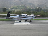 N711WZ @ SZP - 1990 Mooney M20M TLS Turbo BRAVO, Lycoming TIO-540-AF1A 270 Hp, taxi off the active - by Doug Robertson