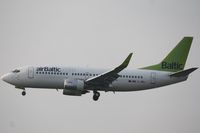 YL-BBJ @ EHAM - Landing 18R - by ghans
