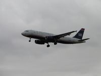 N678AW @ ONT - On final to runway 26L in overcast weather - by Helicopterfriend