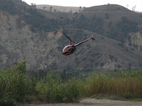 N694DC @ SZP - 2004 Robinson R22 BETA II, Lycoming O-360 derated to 131 Hp, departure - by Doug Robertson