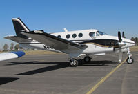 N44HP @ KTLR - 1976 Beech C90 at Tulare, CA for International Ag Exposition - by Steve Nation