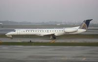 N13979 @ KORD - EMB-145LR - by Mark Pasqualino