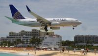 N16732 @ TNCM - landing at St Maarten - by keith newsome