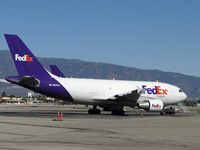 N809FD @ ONT - Parked in Fed Ex overflow space awaiting to be loaded - by Helicopterfriend