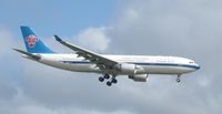 B-6531 @ NZAA - ON final approach to Auckland. So easy to photo here from viewing area. Taken by my 7 yr old son with simple point and shoot old digi camera - no zoom. - by magnaman