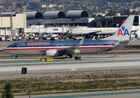 N823NN @ KLAX - Exiting runway 25L