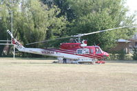 C-GSGT - Just how far from home can one get??  C-GSGT Bell 212 seen on a playing field in Braidwood Australia during the terrible fire season of 2009. - by Pete Hughes