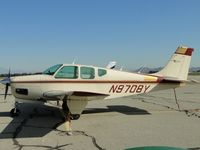 N9708Y @ CNO - Tied down & Parked - by Helicopterfriend