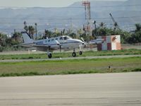 N6305X @ CNO - Landing on runway 26R - by Helicopterfriend