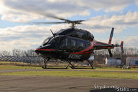N429HC @ 7B9 - Landing at Ellington, CT - by Dave G