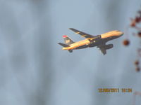 N829AW - Took this photo of N829AW flying over the Sacramento Ca. area on 12/06/2o11 at 4:24 pm California time. - by Tom Wold