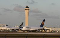 D-AIMF @ MIA - Lufthansa A380 next to a 747 - by Florida Metal