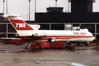 N12301 @ KORD - Rainy day at ORD. Scanned from a print. - by John Meneely