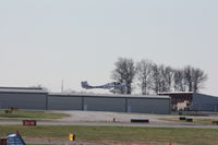 N143KC @ KILG - Departing Runway 32 for left traffic. - by gamesvince