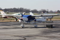 N496SP @ KILG - Cessna sitting on Red Eagle ramp. - by gamesvince