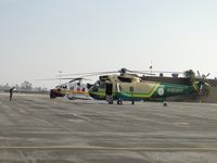 N950DG @ POC - Starting up with a crew member standing just outside main rotor turning area - by Helicopterfriend