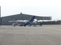 N718EE @ CNO - Taxiing from hanger - by Helicopterfriend