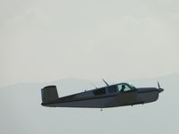 N695K @ CNO - Wheels retracted and headed westbound - by Helicopterfriend
