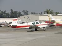 N74770 @ CNO - Preflighting prior to taxiing to runway 26 - by Helicopterfriend