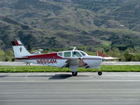 N8964M @ SZP - 1963 Beech 35-B33 DEBONAIR, Continental IO-470-J 225 Hp, landing roll Rwy 22 - by Doug Robertson