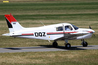 ZK-DQZ @ NZCH - door ajar to get some cool air  on this hot day - by Bill Mallinson