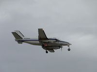 N164HA @ ONT - Passing over the threshold for landing on runway 8R - by Helicopterfriend