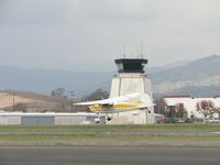 N8157A @ POC - Leaning to the left as a gust of wind blows across the runway during take off - by Helicopterfriend