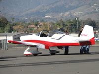 N779AC @ POC - Parked in transient parking and appears to have a small group gathered around for information - by Helicopterfriend