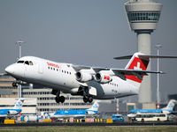 HB-IXW @ EHAM - Take off from Amsterdam Airport of runway24 - by Willem Goebel