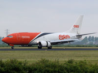 OO-TNA @ EHAM - Landing on runway R18 of Amsterdam Airport. - by Willem Goebel
