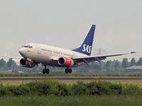 LN-RCU @ EHAM - Landing on runway R18 of Amsterdam Airport. - by Willem Goebel
