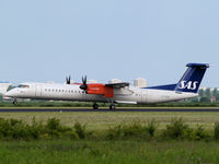 LN-RDR @ AMS - Landing on runway R18 of Amsterdam Airport - by Willem Goebel