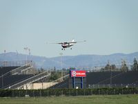 N4823V @ POC - On final approach to runway 26R - by Helicopterfriend