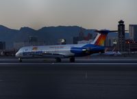 N415NV @ KLAS - Allegiant Air MD-82 in new colors, thrust reversing on RWY 7L