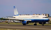 N406UA @ TNCM - N406UA