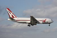 N740AX @ MIA - ABX 767 returning in front of El Dorado - by Florida Metal