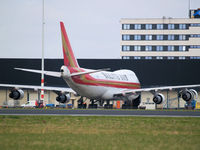 N709CK @ AMS - Loading on the Cargo gate - by Willem Goebel