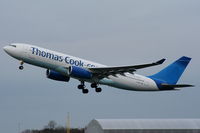 G-OMYT @ EGCC - missing the Thomas Cook logo on the tail after returning from lease with Garuda Indonesia - by Chris Hall