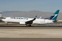 C-GKWJ @ LAS - WestJet Airlines C-GKWJ (FLT WJA988) from Vancouver Int'l (CYVR) landing RWY 25L. - by Dean Heald