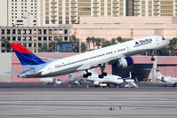N678DL @ LAS - Delta Airlines N678DL (FLT DAL1080) departing RWY 1R en route to Hartsfield-Jackson Atlanta Int'l (KATL).