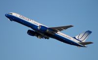 N574UA @ KLAX - N574UA takes off with gears still retracting