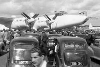 WG557 @ EGLF - Austin, Vauxhall, Morris ..oh, and an Avro Shackleton MR2 at the Farnborough Air Show in September 1955. - by Harry Longden